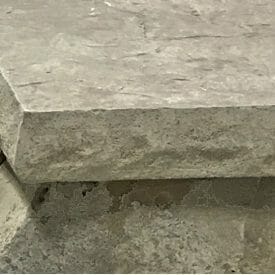 Concrete-Countertop-Edge-Form-chiseled-granite
