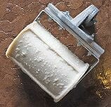 worn brick concrete border roller